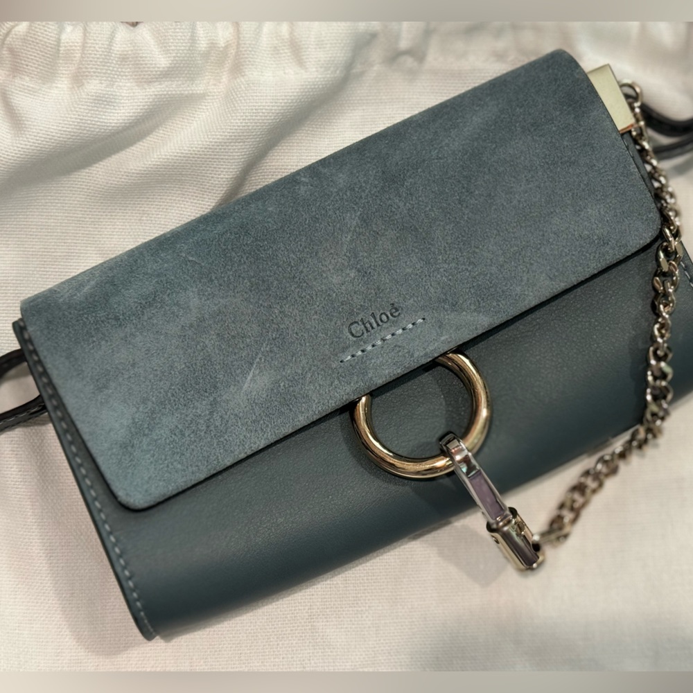 Chloe mini clutch, also used as a crossbody includes strap includes dust bag.